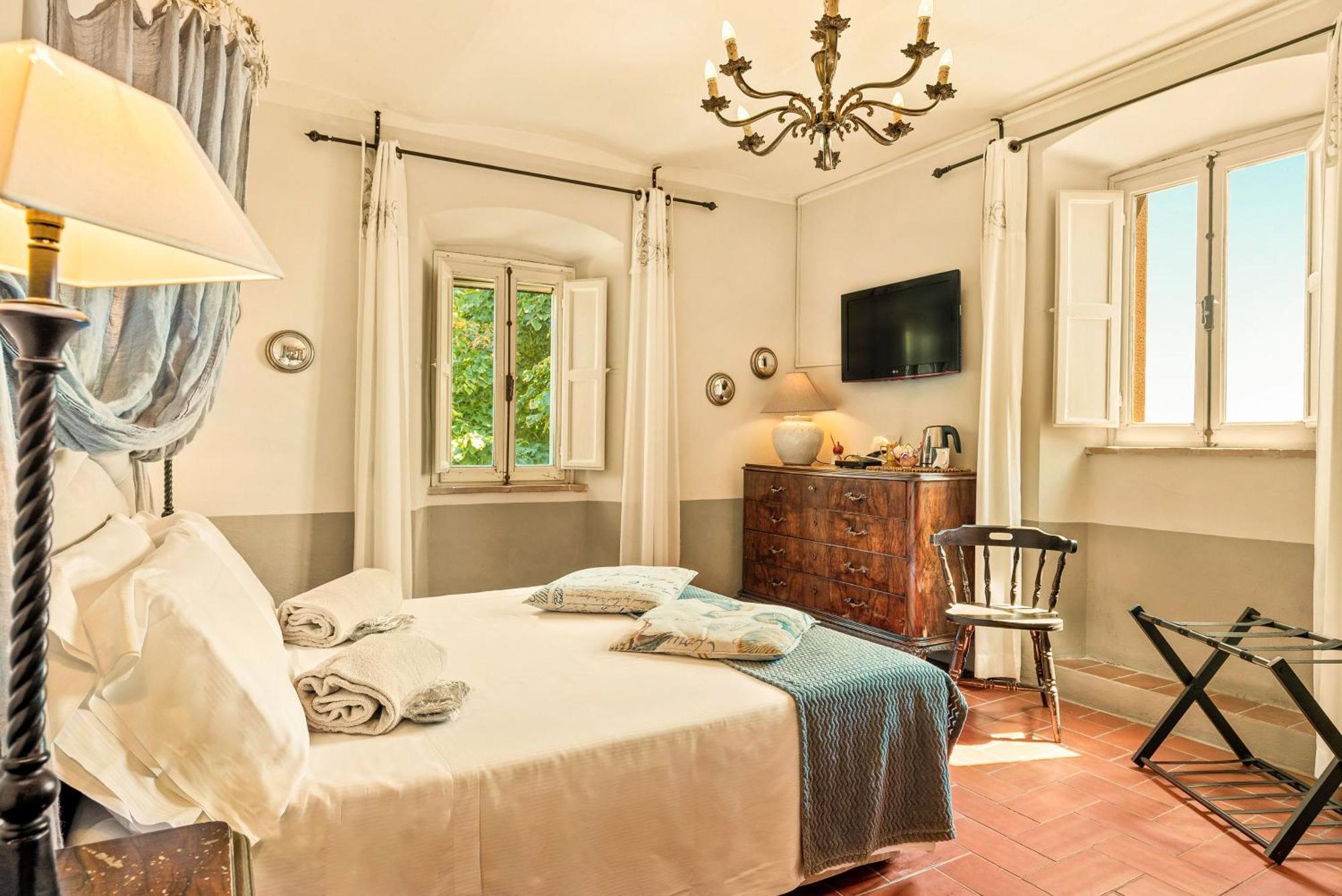 I Capricci Di Merion - Resort & Spa 特拉西梅诺湖畔托罗 外观 照片
