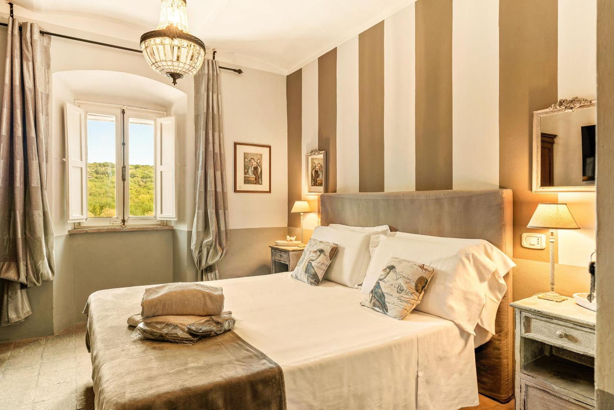 I Capricci Di Merion - Resort & Spa 特拉西梅诺湖畔托罗 外观 照片